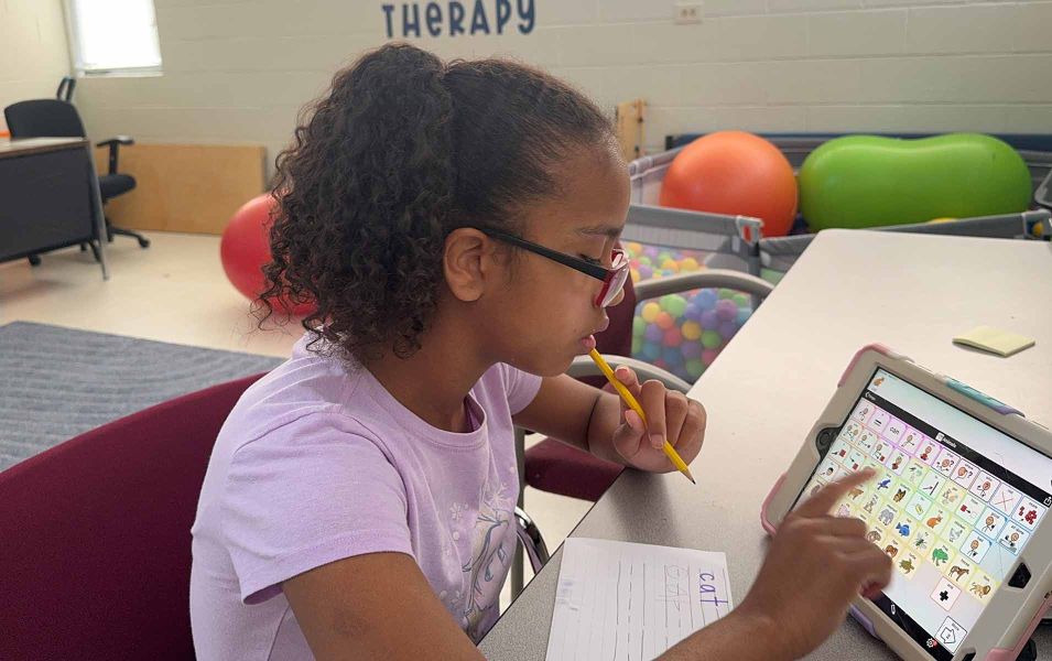 Young girl using a tablet 